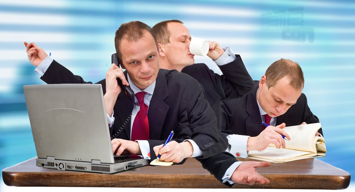 Geschäft gestalten Photo: Ein Mann mit vielen Armen tut viele Sachen gleichzeitig.<br />©corepics, ©memephoto